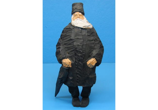 Döderhultarns skulptur "Läroverksadjunkt Hjalmar Beronius".